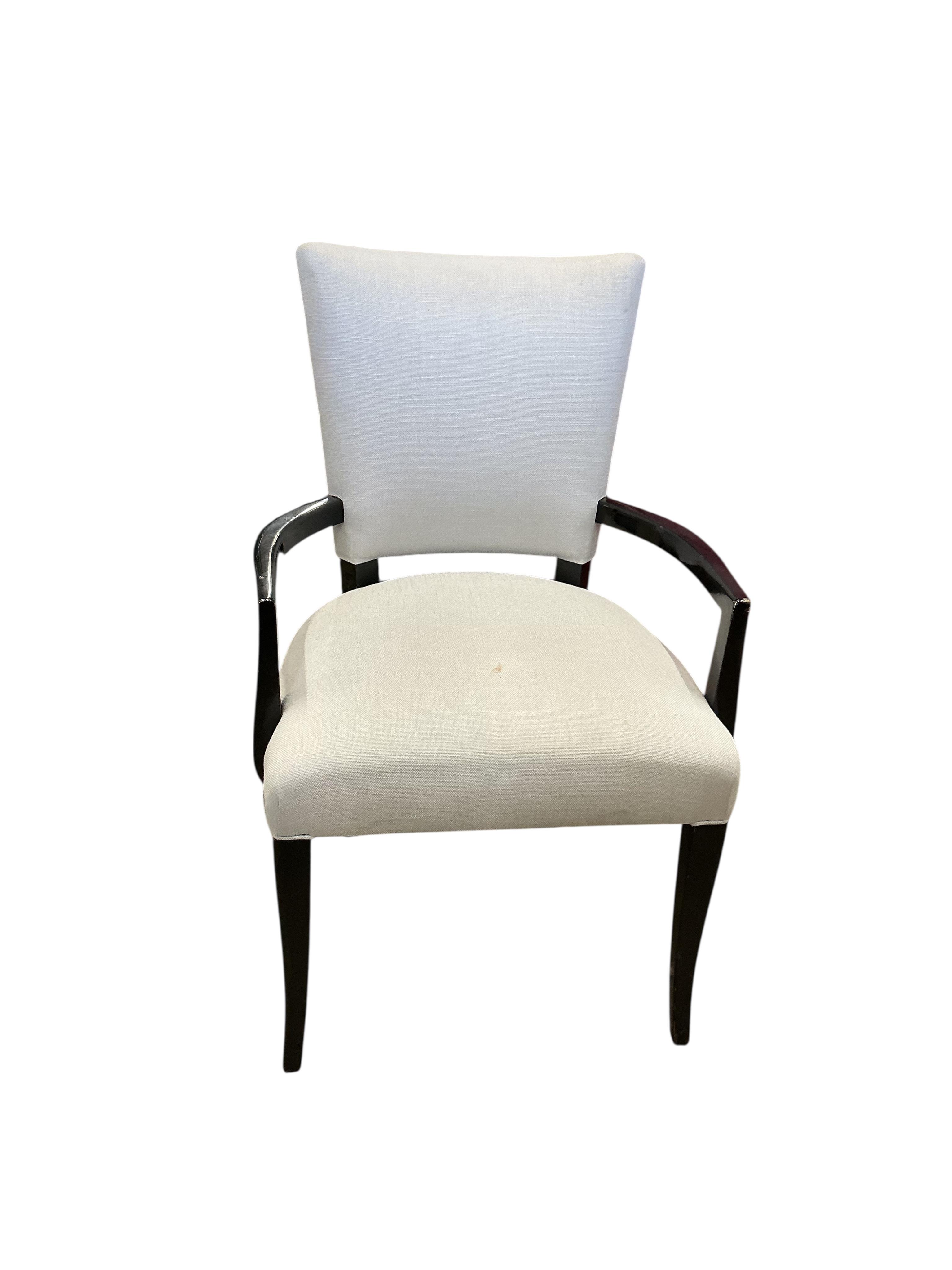 Seven contemporary ebonised and grey fabric elbow chairs, five with arms